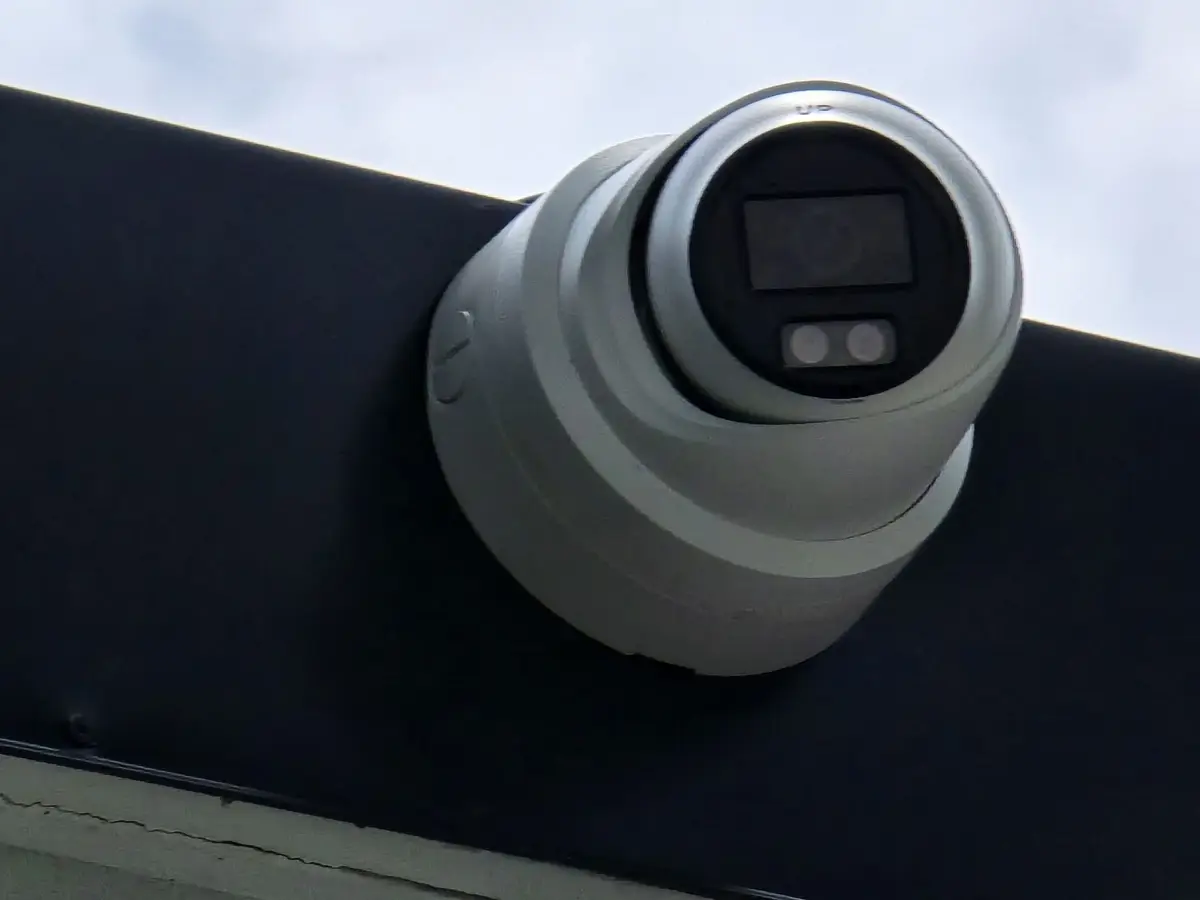 Close-up of a turret camera on a roof edge